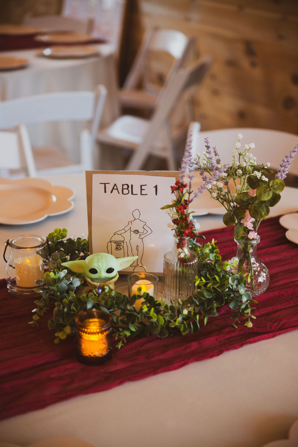 Star Wars Table 1 centerpiece with Grogu and Leia art for Jen & Alec's reception at Covey Creek