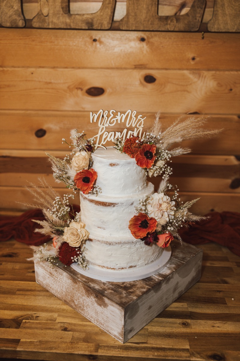 Semi-naked autumn cake with Mr & Mrs Seamon topper for Danika & Troy's reception at Covey Creek