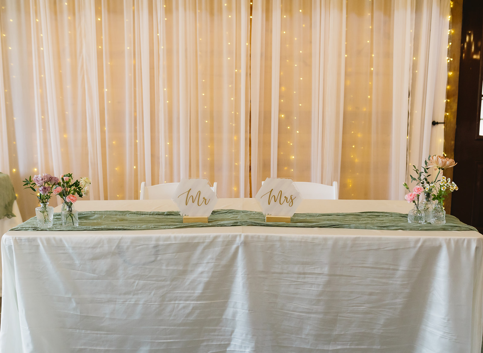 Mr & Mrs hexagonal signs and bud vases dress Meredith & Benjamin's sweetheart table at Covey Creek