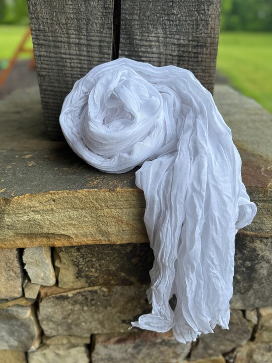 White cheesecloth runner